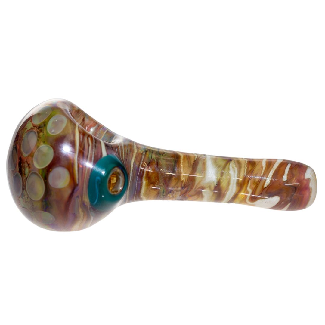 Left side view of a brown Fool Blown spoon. Fool Blown glass creates functional art that layers colors to create a 'melted' appearance. - Up N Smoke.