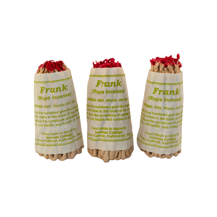 "Three bundles of Frankincense Rope Incense with red tips on a white background," - Up N Smoke.