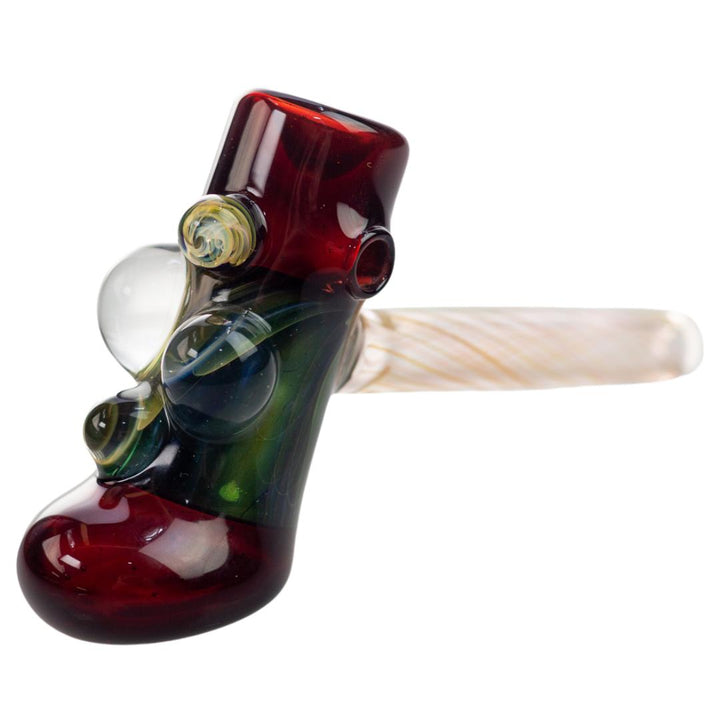 Front left view of a burgundy King Leo hammer. This piece features four glass bubbles of varying colors and techniques utilized to create them. - Up N Smoke.