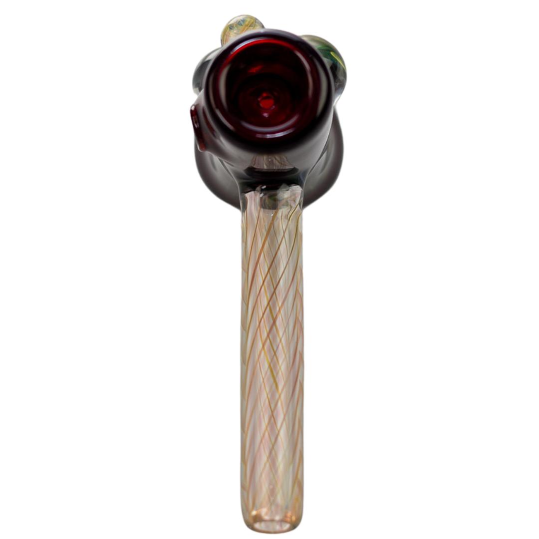 Top down view of a burgundy King Leo hammer. The front of this piece features four glass bubbles of varying colors. The stem has brown hatching swirls and is about 3.5 inches long. - Up N Smoke. 