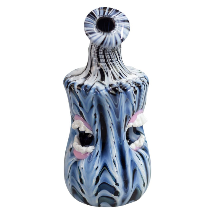 Back view of a Pebbled Sculpted rig with a melted baby blue, black and white design. This piece is embellished with glass mouths. - Up N Smoke.