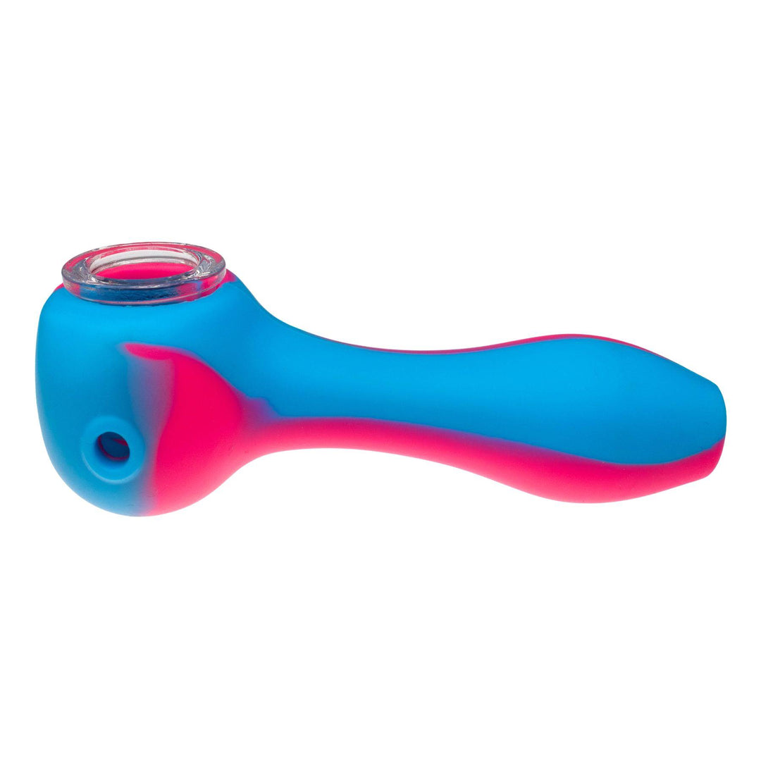 "Left-side of a blue and pink silicone hand pipe against a white background," - Up N Smoke.
