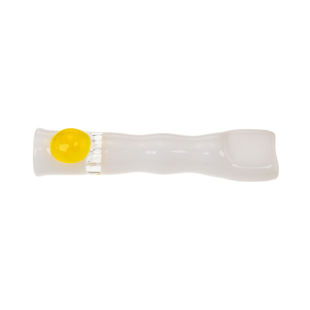 "White Blazing Glass Honeycomb Chillum with a yellow bead near the mouthpiece," - Up N Smoke.